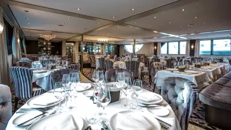 Interior of restaurant dining area aboard the Thomas Hardy ship