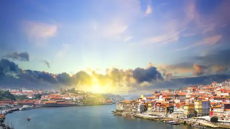 Colourful view of Douro riverside and the Dom Luiz bridge, Portugal.