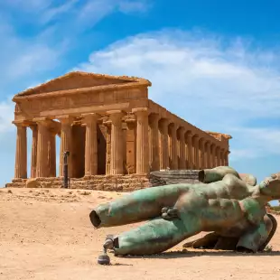 Fallen Statue of Icarus and Temple of Concordia, Valley of the Temples, Agrigento, Sicily, Italy