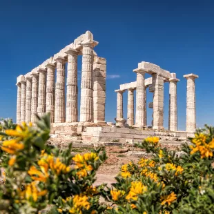 Cape Sounion with ruins of an ancient Greek temple of Poseidon in Attica, Greece