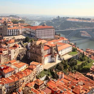 An aerial shot of the Porto Cathedrals next to the Douro River, Portugal