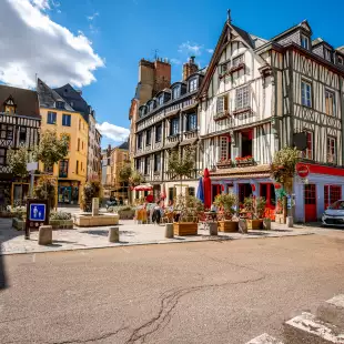 Street view of beautiful buildings and cafes in Rouen Old Town, Normandy, France