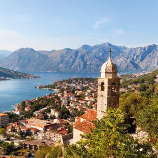 Bay view of the Montenegrin town Kotor and the belltower of Church of Our Lady of Remedy