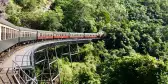 The Kuranda Railway train travelling along the largest bend in the track