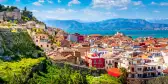 Peloponnese old town houses and snow mountains view