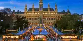 Traditional Christmas market at Vienna Town Hall at night in front of town hall