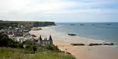 Arromanches Gold beach on a bright day in Normandy 