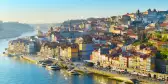 Aerial skyline shot of the colourful buildings in Porto Old Town in sunset light, Portugal.
