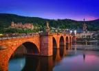 The old bridge in Heidelberg city and colourful evening sky in Germany