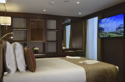 Interior of Deluxe Balcony Suite aboard the Douro Splendour ship