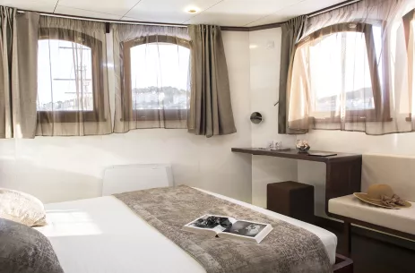 Double bed cabin room aboard the MV Corona