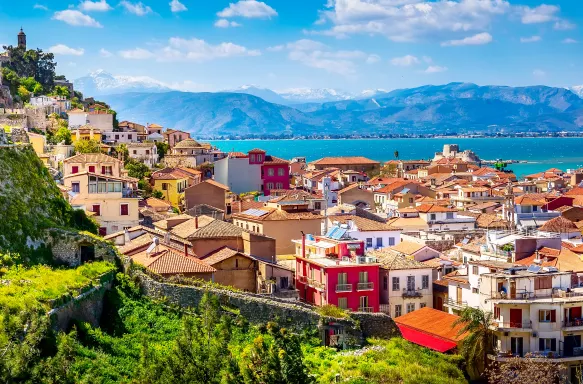 Peloponnese old town houses and snow mountains view