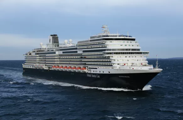 Side view of a cruise ship in transit along the ocean