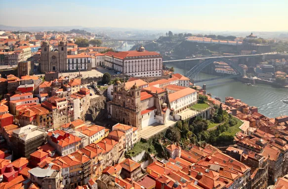 An aerial shot of the Porto Cathedrals next to the Douro River, Portugal
