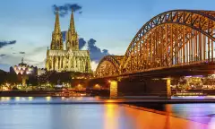 Cologne Cathedral and Hohenzollern bridge illuminated in Cologne, Germany