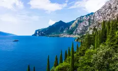 Lake Garda with mountains and vegetation in Italy