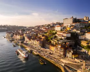 Aerial view of old town of Porto at sunset in Portugal.