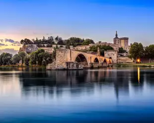 Avignon Bridge with Popes Palace and Rhone river in Pont Saint-Benezet, France