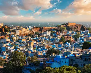 Aerial shot of Jodhpur town with blue and white buildings in Rajasthan, India