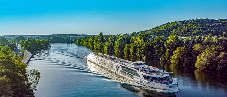 Jane Austen river cruise ship from Riviera sailing down the blue waters on the moselle river 