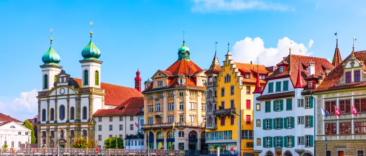 Colourful houses overlook the Reuss River in Lucerne, Switzerland