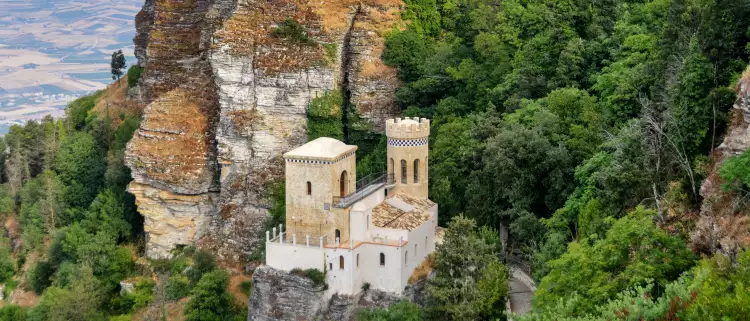 Historic Fort and lush vegetation on rocky clifftop in Erice, Sicily, Italy