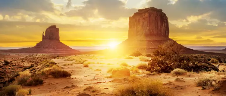 Sunset at the sisters in Monument Valley, USA