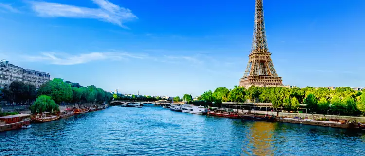 View of the Eiffel Tower and river Seine on a sunny day in Paris, France